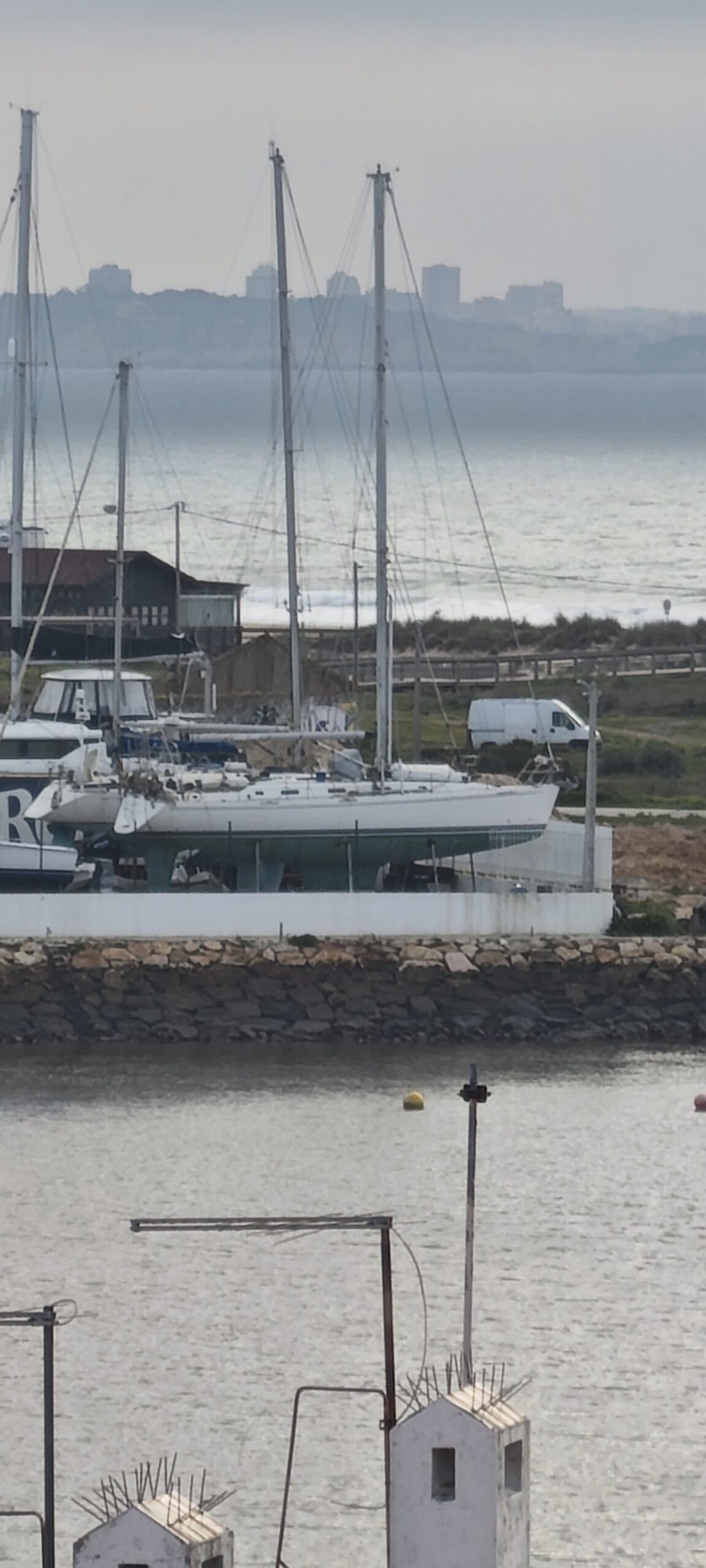 Lancastrian seen from across the Lagos boatyard before the refit